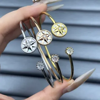 سوارات مفتوحة ذهبية وفضية وذهبية وردية بتصميم نجمة البوصلة والكريستال الوحيد