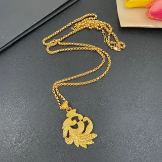 Collier avec pendentif floral en filigrane doré