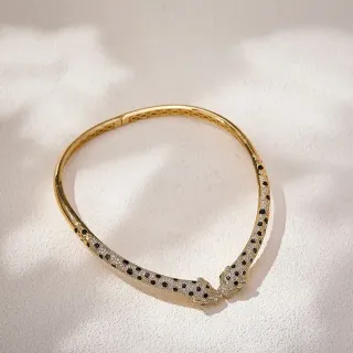 Brazalete Dorado Pavé Doble Cabeza de Animal