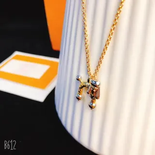 Collier pendentif chien doré bicolore