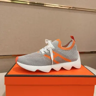 سنيكرز رمادي برتقالي upper نسيج midsole منحوت موجي