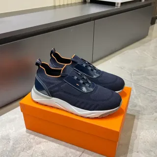 Zapatillas slip-on sin cordones color azul marino y naranja con parte superior de punto