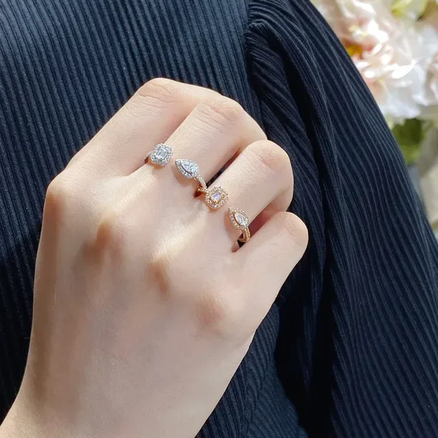Open-Band Dual-Stone Pavé-Set Emerald and Pear Cut Ring 9