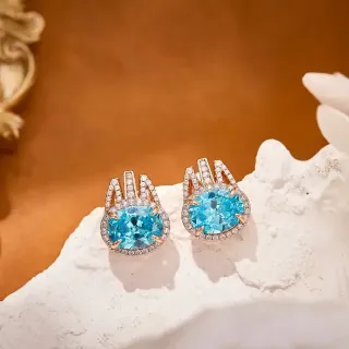 Brincos gema azul oval pavé halo