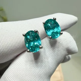 Oval Faceted Teal Gemstone Four-Prong Stud Earrings