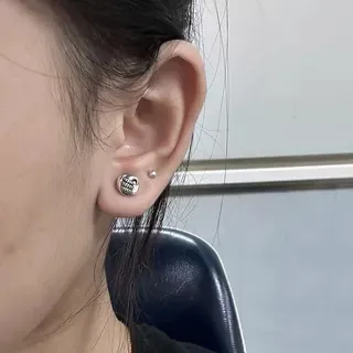 Silver-Toned Knuckle Fist Stud Earrings 2