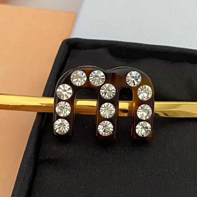 Tortoiseshell and Crystal Gold-Tone H-Motif Brooch 4