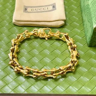 Gucci سوار بون لينك مشبك رأس الأسد تون ذهبي
