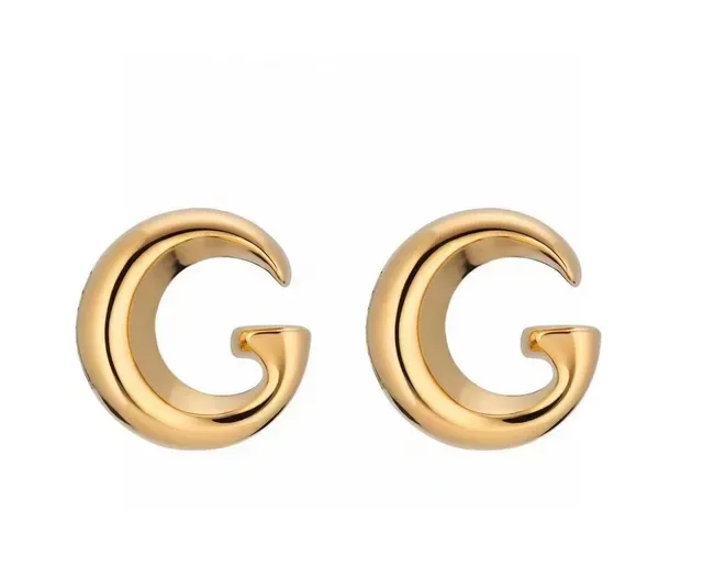Boucles d'oreilles Gucci en forme de C ton doré 6