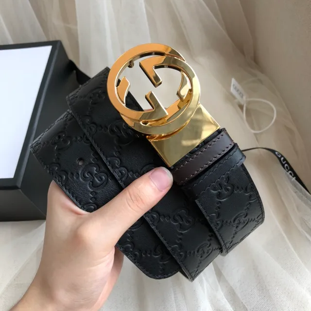 Ceinture Gucci GG Marmont noire et or avec monogramme embossé et boucle de G entrelacée en cuir 2