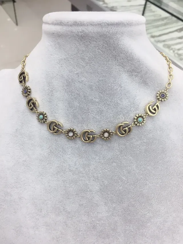 Collier Gucci GG Marmont Chaîne Or Bleu Motifs G Entrelacés 2