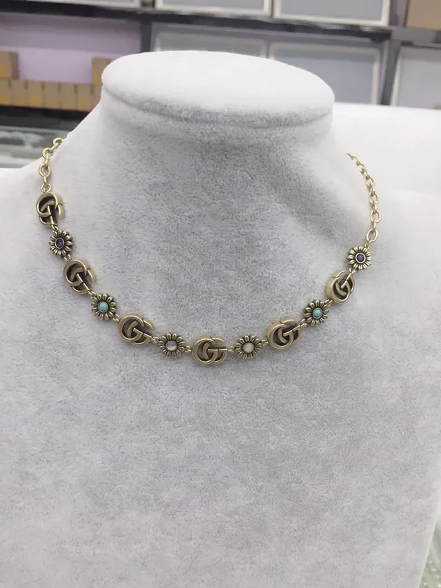 Collier Gucci GG Marmont Chaîne Or Bleu Motifs G Entrelacés 6