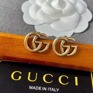 Gucci GG Marmont Interlocking Double G Brincos dourados