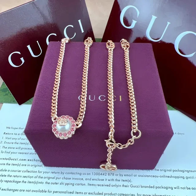 سوار Gucci GG Marmont ذهب وردي مزين بالكريستال سلسلة كيرب 5
