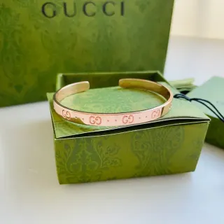 غوتشي GG Monogram سوار مفتوح ذهب وردي