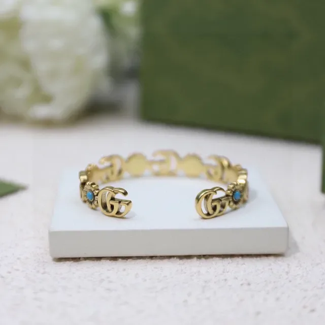 Gucci Interlocking GG Floral Motif Gold-Toned Ring 5
