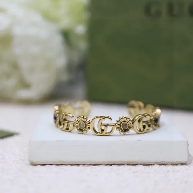 Gucci Interlocking GG Floral Motif Gold-Toned Ring 8