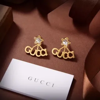 Gucci Logo Star أقراط ذهبية شفافة