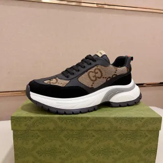 Gucci Rhyton काले और बेज GG Monogram मोटी स्नीकर्स