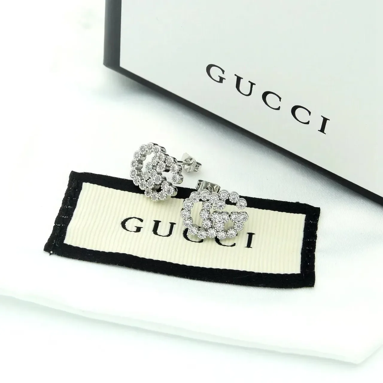 أقراط غوتشي Running G Pavé بالماس الذهب عيار 18 2