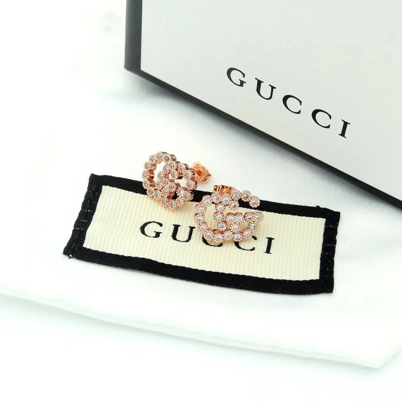 أقراط غوتشي Running G Pavé بالماس الذهب عيار 18 4