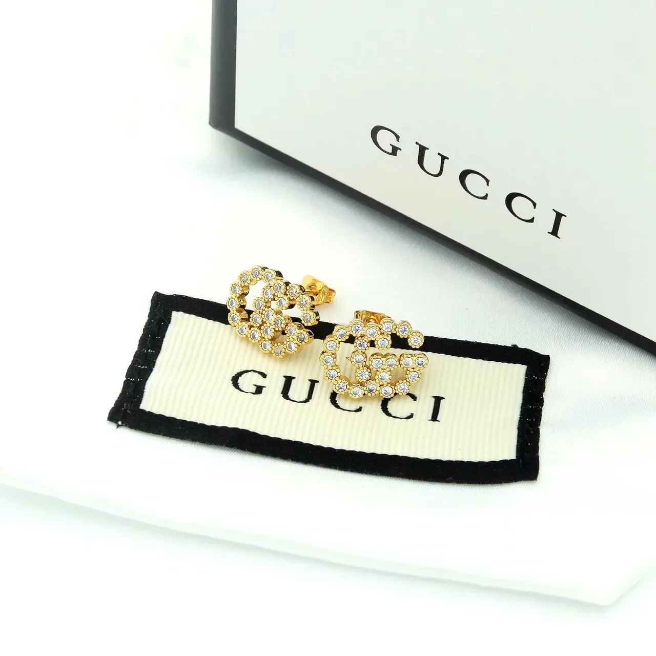 أقراط غوتشي Running G Pavé بالماس الذهب عيار 18 6