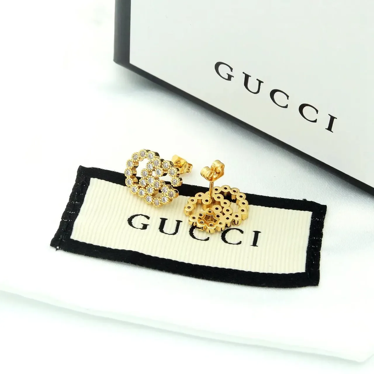 أقراط غوتشي Running G Pavé بالماس الذهب عيار 18 7