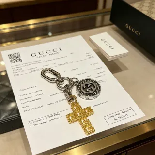 Gucci فضة وذهب ثنائي اللون معدني متشابك G سوار مداليون