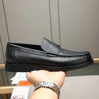 Hermès কালো পেবল্ড চামড়া পেনি স্ট্র্যাপ লোফার