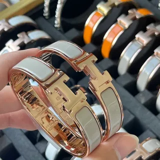 Hermès Clic H ব্রেসলেট সাদা এনামেল গোলাপি সোনার টোন ধাতু ব্রেসলেট