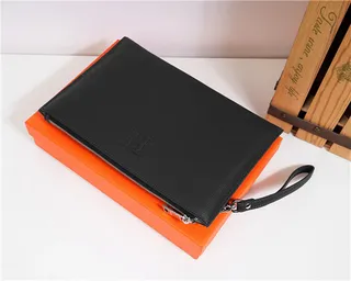 Hermès Bleu marine Cuir texturé grainé Logo H embossé wristlet 17
