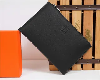 Hermès Bleu marine Cuir texturé grainé Logo H embossé wristlet 18