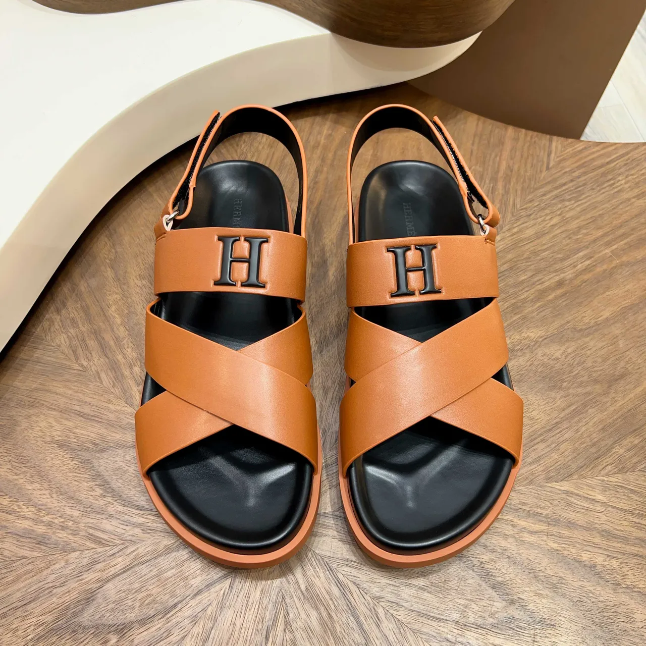 Hermès Oran Brown Black Crossed Leather Straps Prominent H-Buckle Hardware Gladiator Sandals 7