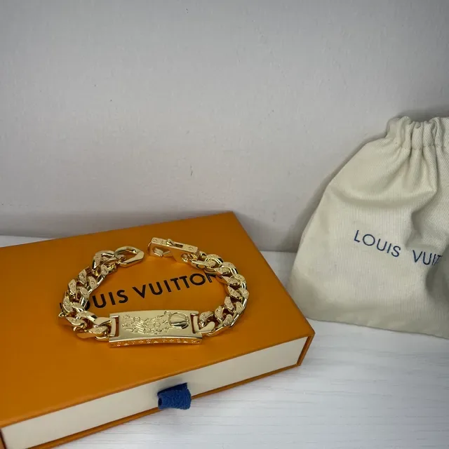 Pulsera Louis Vuitton Chain Reaction de tono dorado con eslabones curb 2