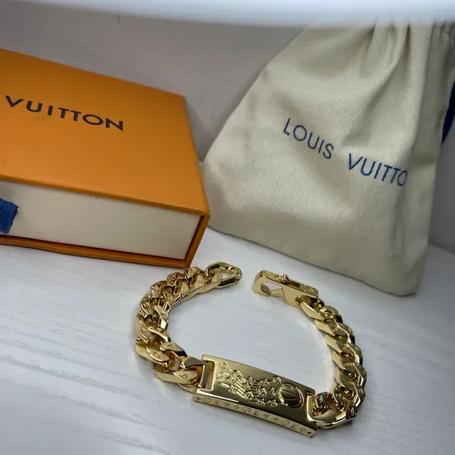 Pulsera Louis Vuitton Chain Reaction de tono dorado con eslabones curb 3