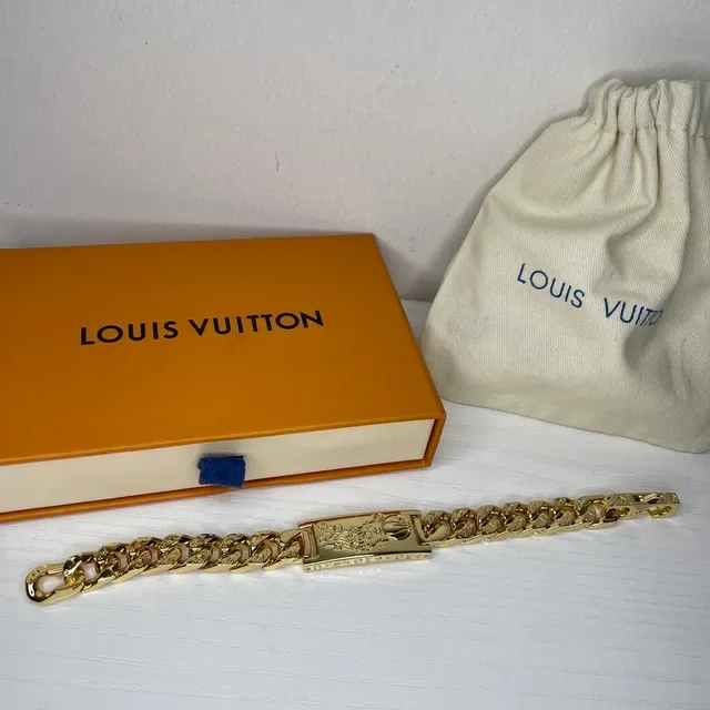 Pulsera Louis Vuitton Chain Reaction de tono dorado con eslabones curb 4
