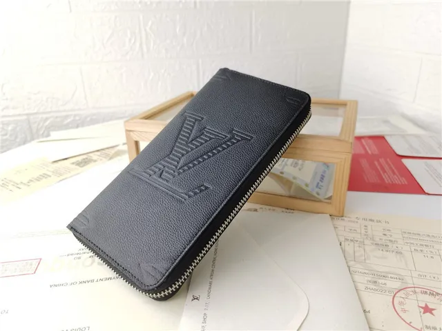 Louis Vuitton Embossed Monogram Black Long Wallet 7