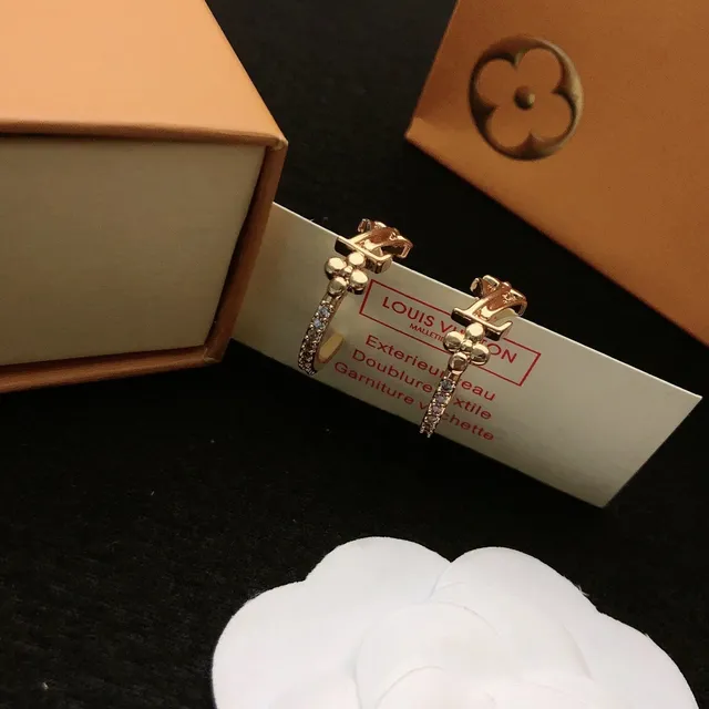 Louis Vuitton motivo floral aretes de aro dorados 5