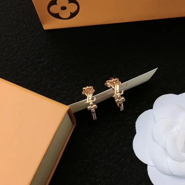 Louis Vuitton motivo floral aretes de aro dorados 7