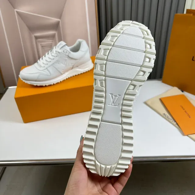 Louis Vuitton LV Trainer White Embossed Monogram Leather Ribbed Side Panels Lifestyle Sneakers 2
