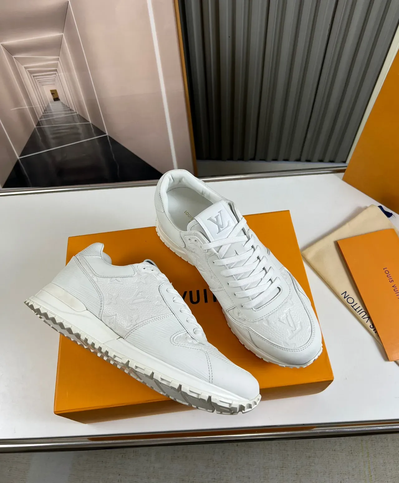 Louis Vuitton LV Trainer White Embossed Monogram Leather Ribbed Side Panels Lifestyle Sneakers 5