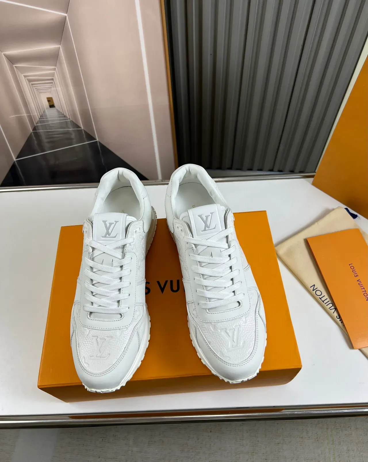 Louis Vuitton LV Trainer White Embossed Monogram Leather Ribbed Side Panels Lifestyle Sneakers 9