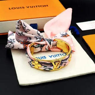 Louis Vuitton brazalete dorado con bufanda integrada