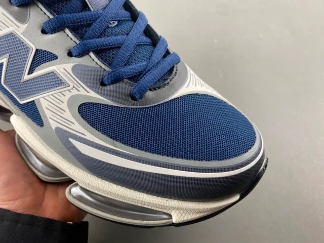 نيو بالانس أحذية رياضية سميكة Navy Gray، تجهيز هوائي مرئي مقسم، طبقة علوية شبكية وصناعية 2