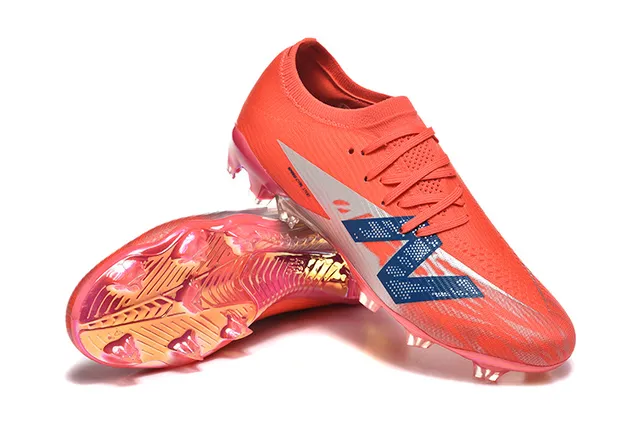New Balance أحذية كرة القدم برتقالي أزرق منخفض القطع upper يناسب الجورب نظام الرباط غير المتماثل أرضية صلبة 7