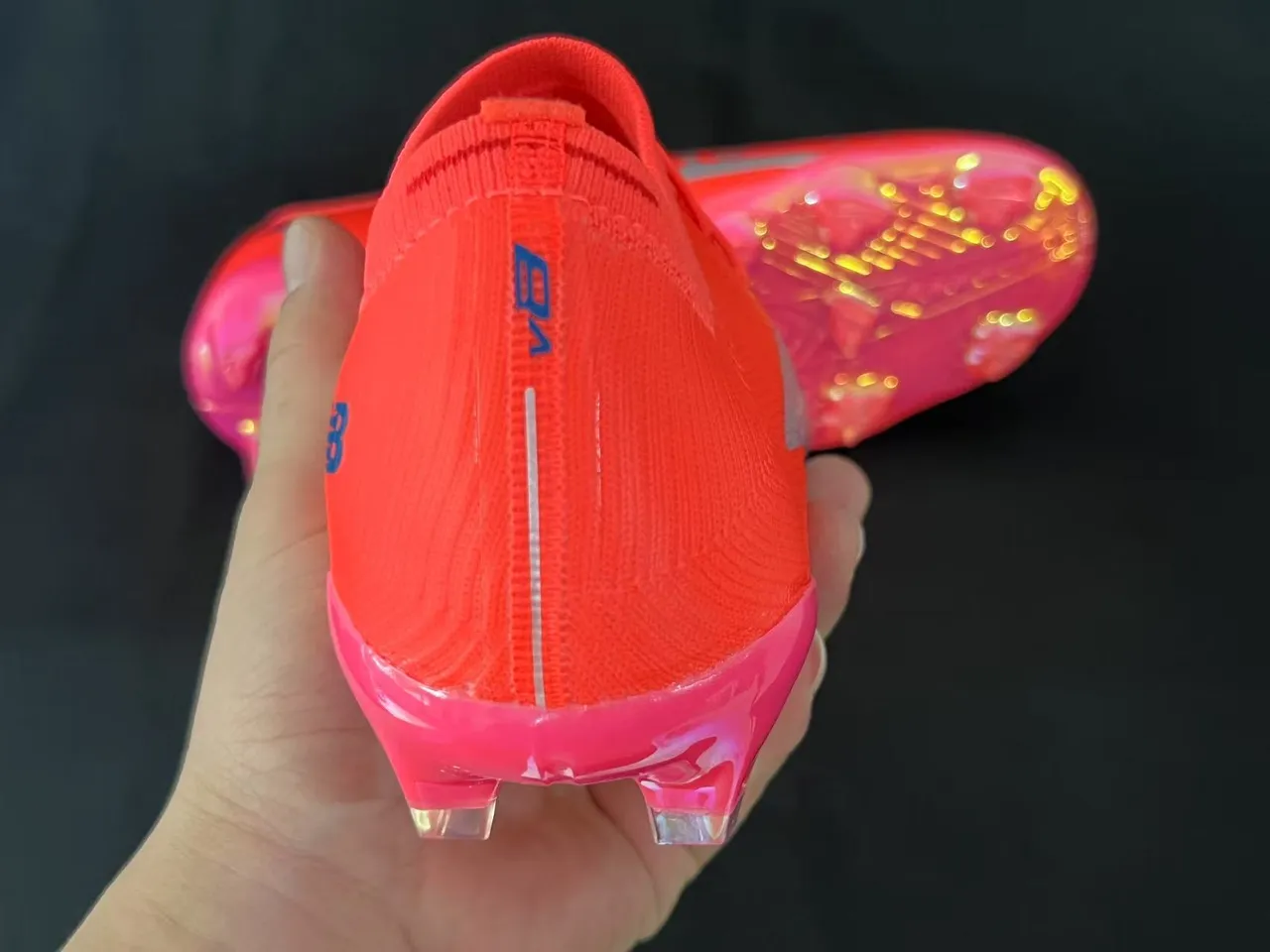 New Balance أحذية كرة القدم برتقالي أزرق منخفض القطع upper يناسب الجورب نظام الرباط غير المتماثل أرضية صلبة 12