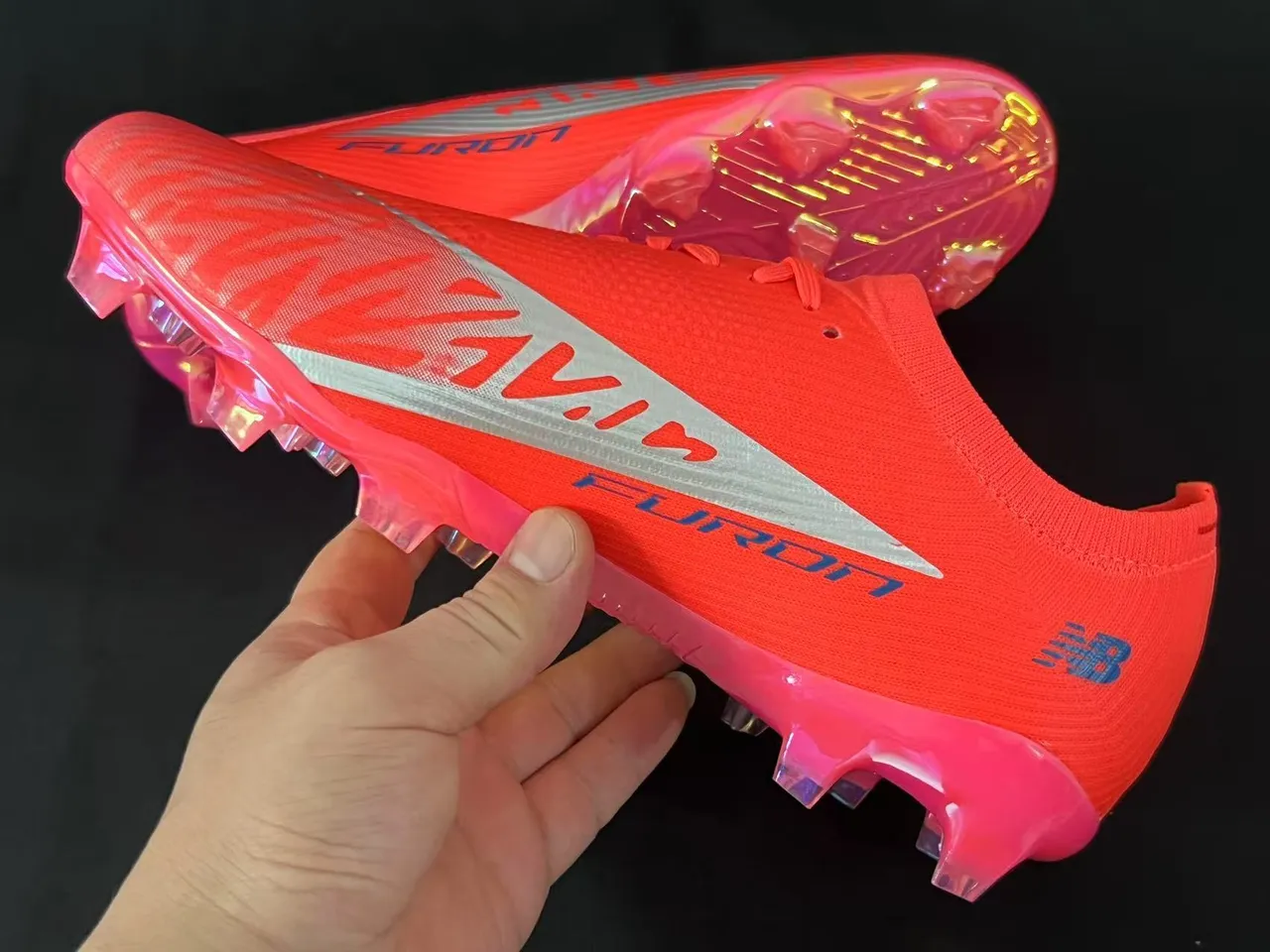 New Balance أحذية كرة القدم برتقالي أزرق منخفض القطع upper يناسب الجورب نظام الرباط غير المتماثل أرضية صلبة 13