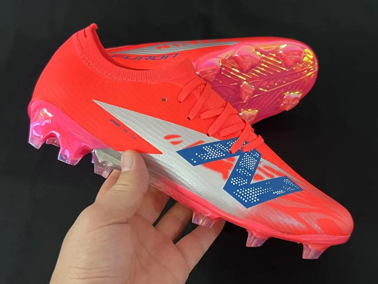 New Balance أحذية كرة القدم برتقالي أزرق منخفض القطع upper يناسب الجورب نظام الرباط غير المتماثل أرضية صلبة 15