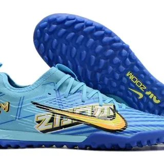 Nike Chuteira Turf Azul e Amarelo Flyknit Leve com Overlay Gráfico Vibrante