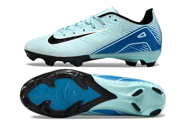 Nike Phantom GT Chaussures de football bleu noir low-cut avec upper synthétique et texture chevron pour terrain ferme 6